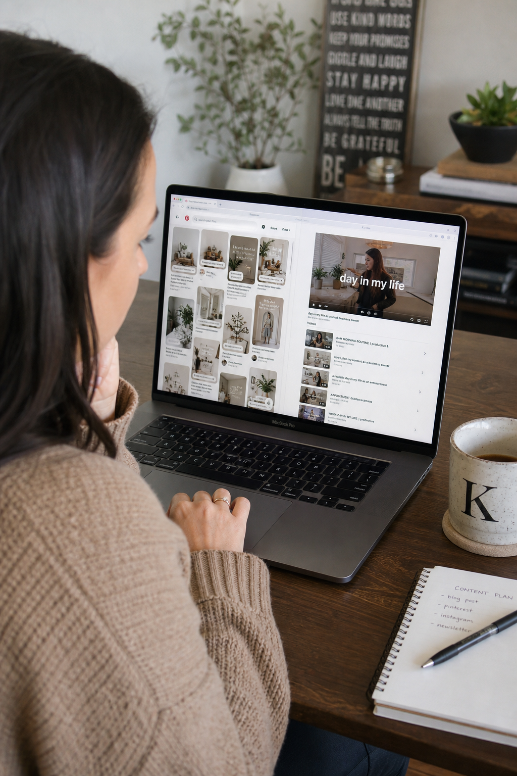 Lifestyle photo of a business owner reviewing Pinterest pins and video content on a laptop
